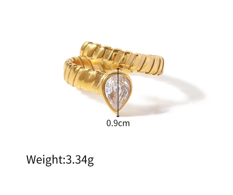 Clear stone ring by itself with white background and measurements
