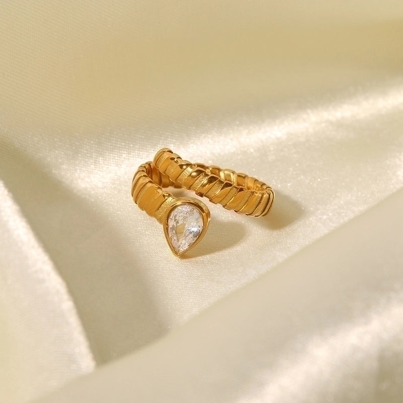Diamond like stone ring on satin fabric