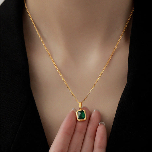 Necklace being worn and the pendant being held by another person