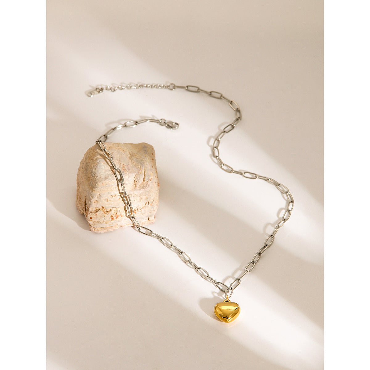 Necklace on top of rock 