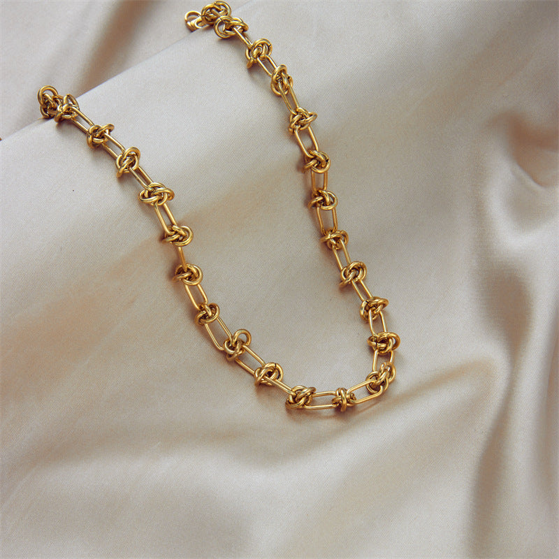 Gold chain on Fabric